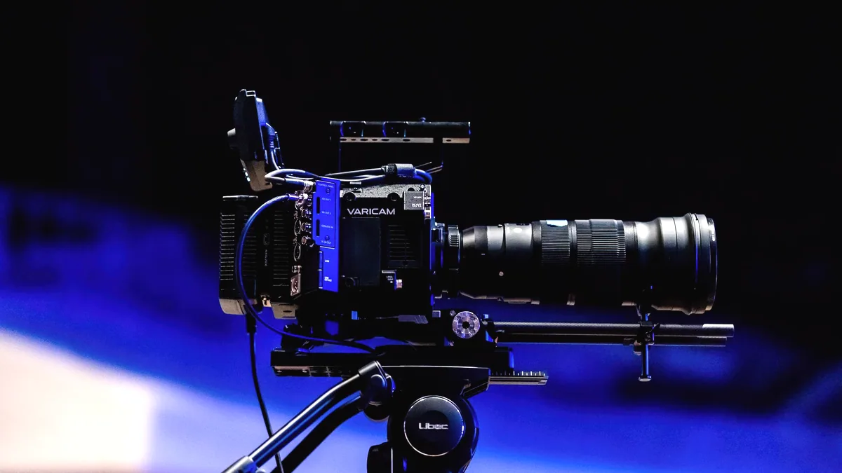 A camera on a tripod.